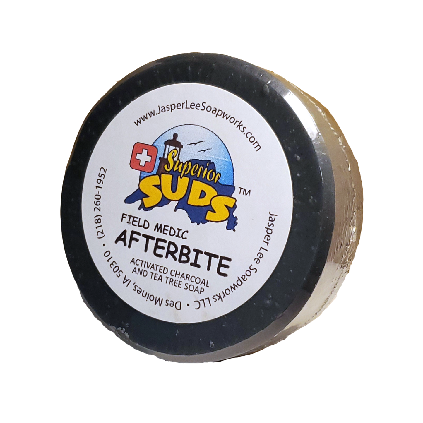 Field Medic Afterbite activated charcoal and tea tree bar in clear biodegradable packaging