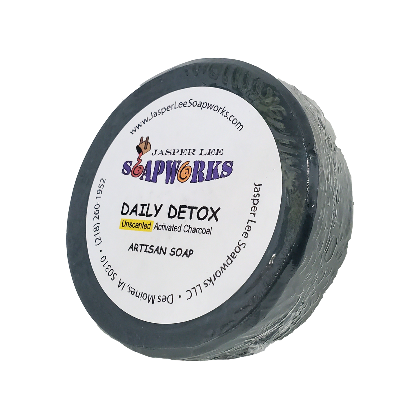 Unscented Daily Detox activated charcoal soap in biodegradable clear packaging