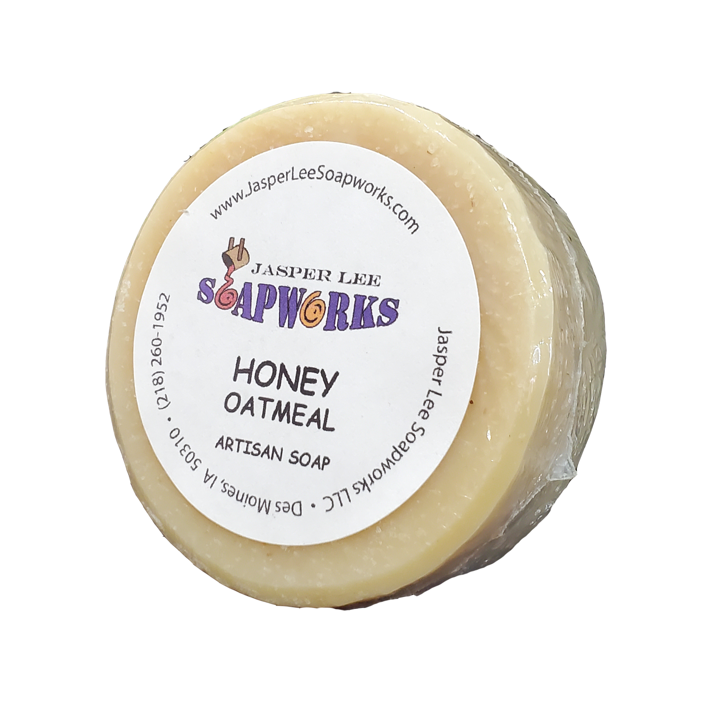 Round Honey Oatmeal soap bar in clear biodegradable packaging